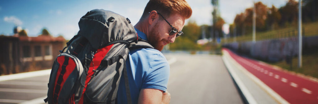 Pack a Backpack for Travel - man with backpacks