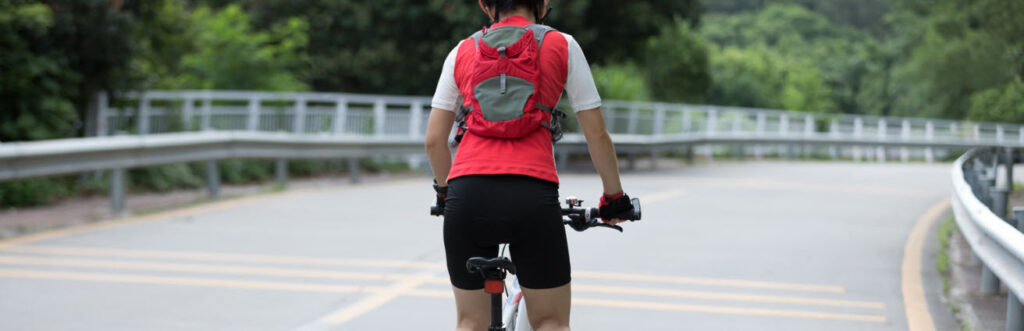 backpacks for cycling - cyclist with small backpack